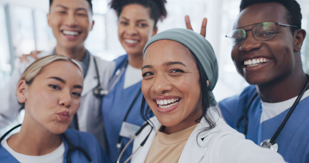 A group of smiling medical professionals at work
